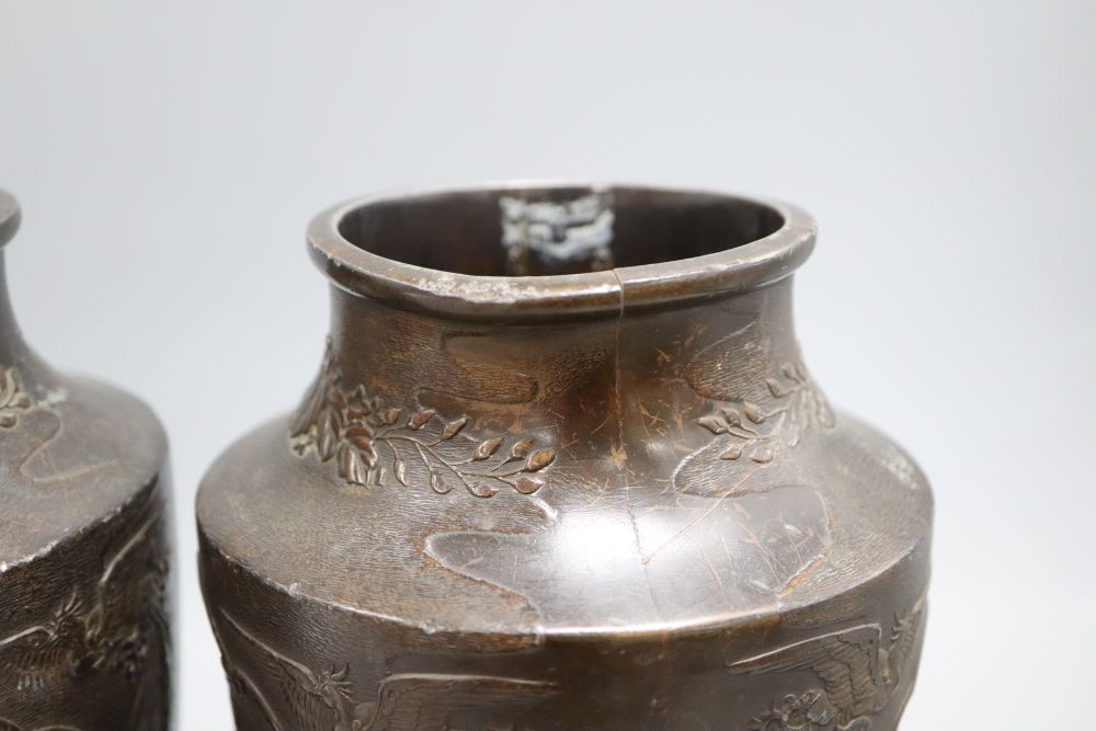 A pair of Chinese bronze vases, height 24cm